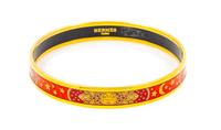 An Hermès Red and Orange Narrow Enamel 70mm Bangle, 2.75" diameter, .4" W.