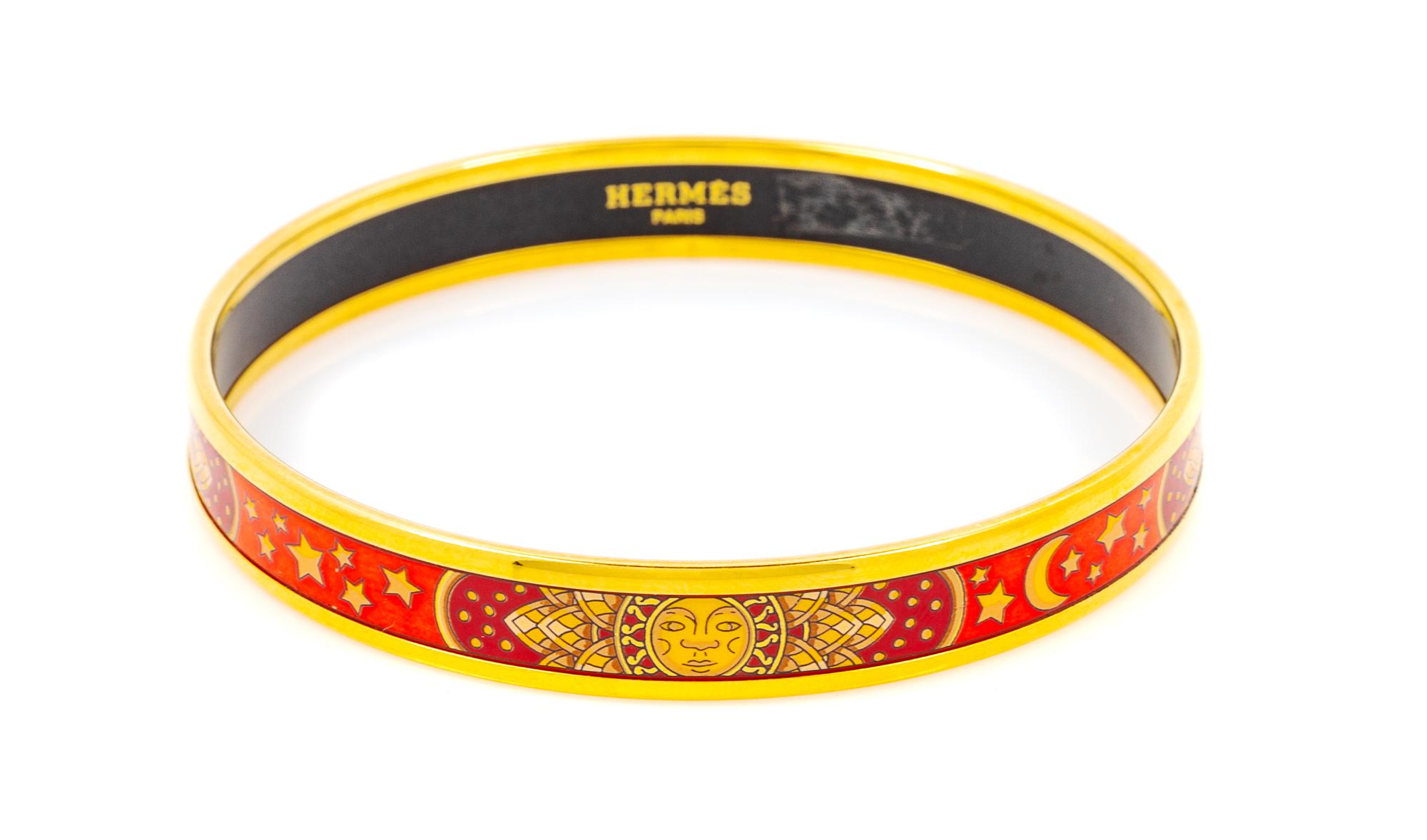 An Hermès Red and Orange Narrow Enamel 70mm Bangle, 2.75" diameter, .4" W.