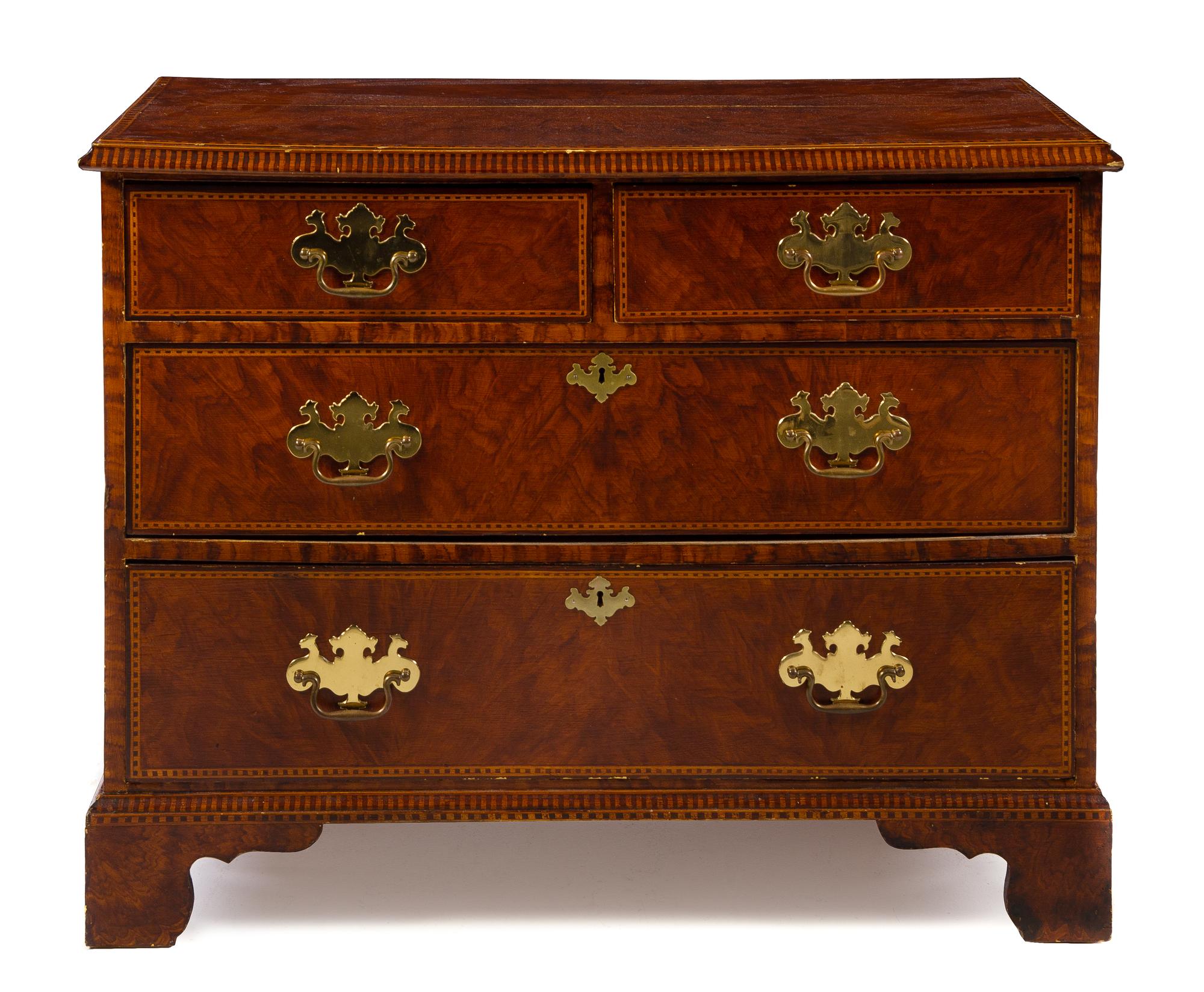 A Faux Burlwood Chest of Drawers Height 30 x width 38 1/4 x depth 18 inches.