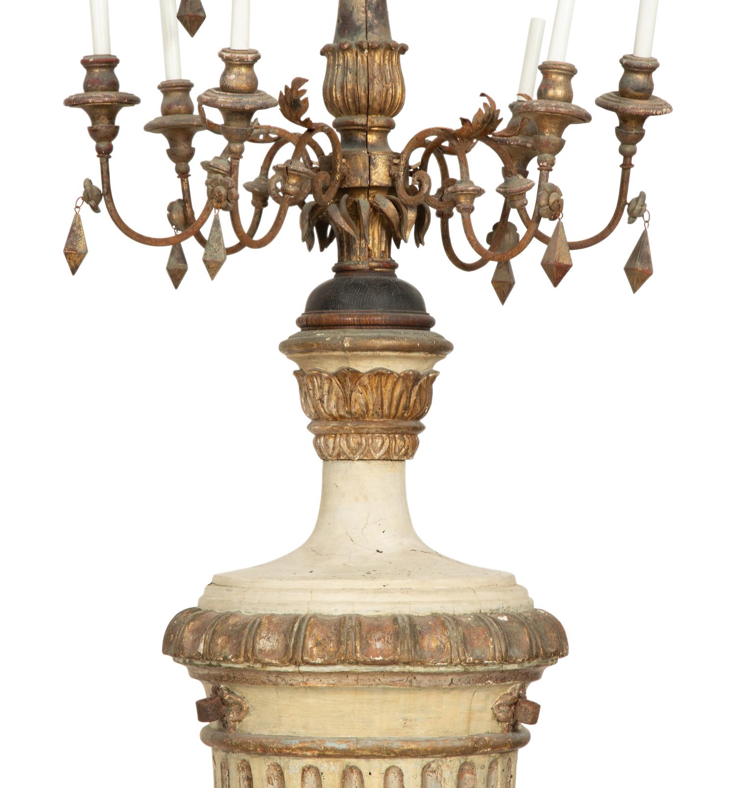 A Pair of Italian Painted and Parcel Gilt Ten-Light Torcheres