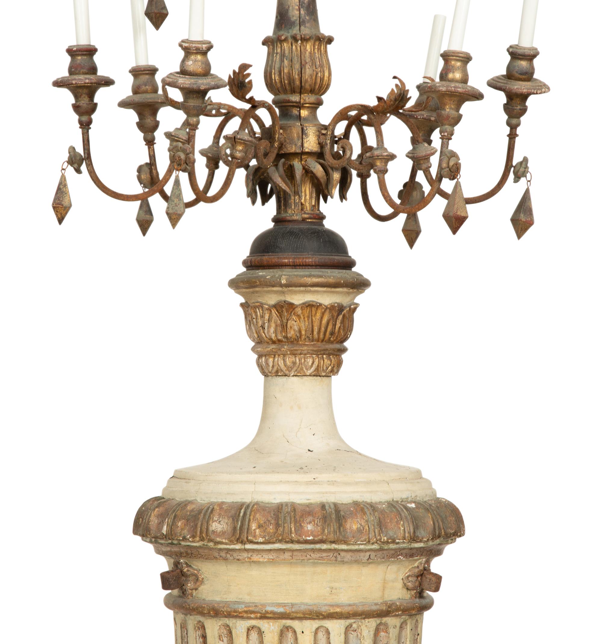 A Pair of Italian Painted and Parcel Gilt Ten-Light Torcheres