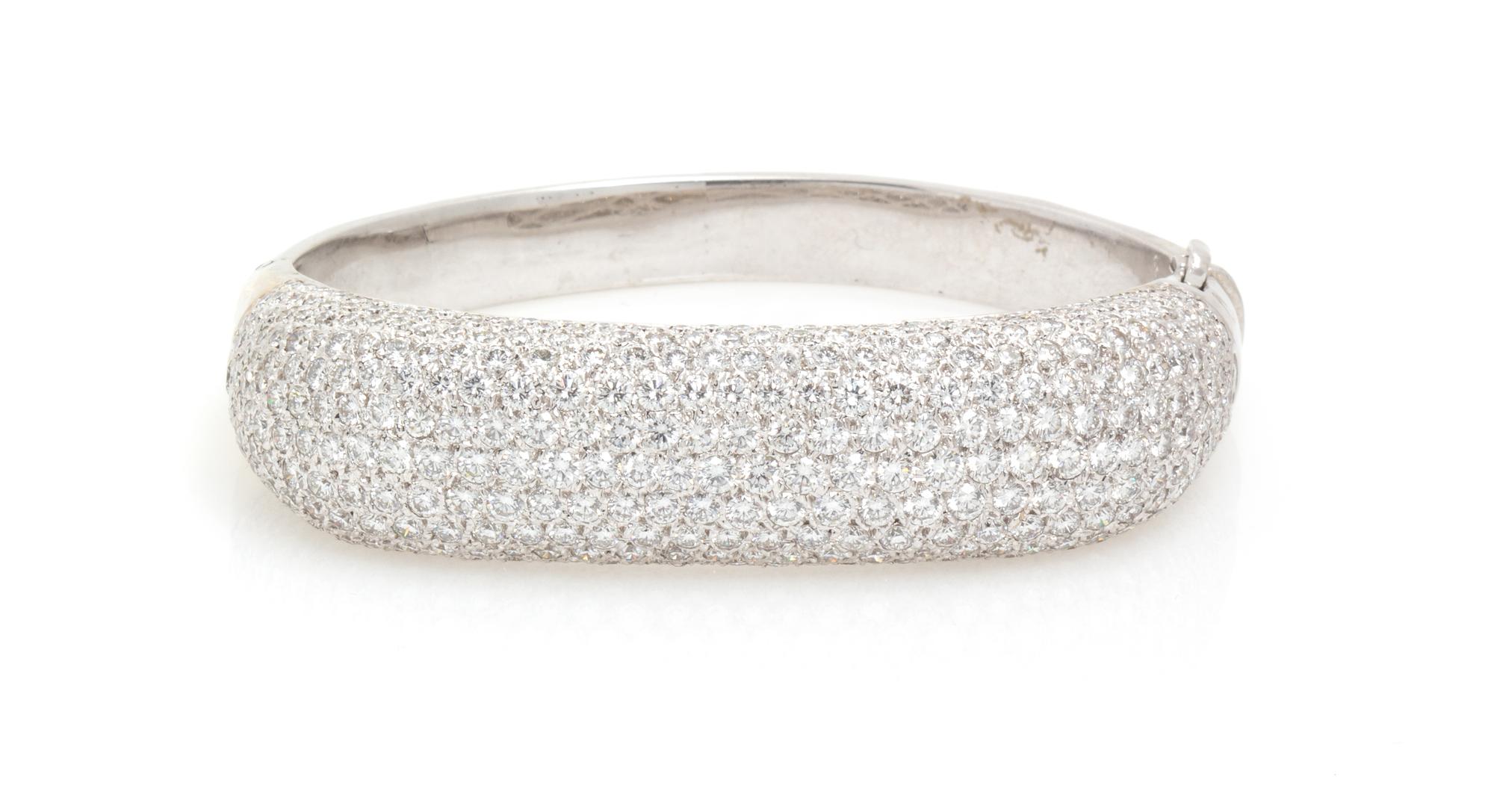 A White Gold and Diamond Bangle Bracelet, 33.10 dwts.