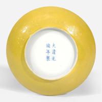 A Chinese yellow-ground dish and a yellow-ground teapot and cover 黄釉小盘和黄釉带盖茶壶一件 Guangxu mark(dish), Jurentang mark(teapot), and possibly of the period ???(??), ????(??), ?????
