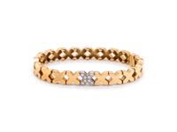 TIFFANY & CO., YELLOW GOLD AND DIAMOND 'X' BRACELET