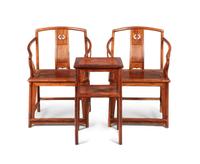 A Set of Huanghuali Armchairs and Side Table