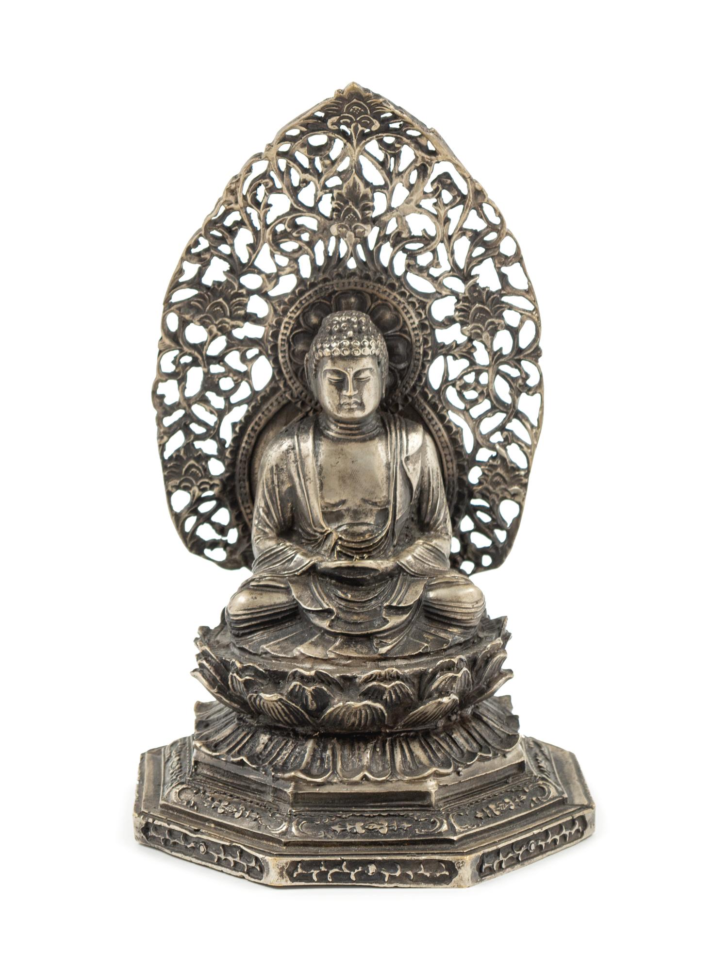 A Japanese Bronze Figure of Seated Buddha