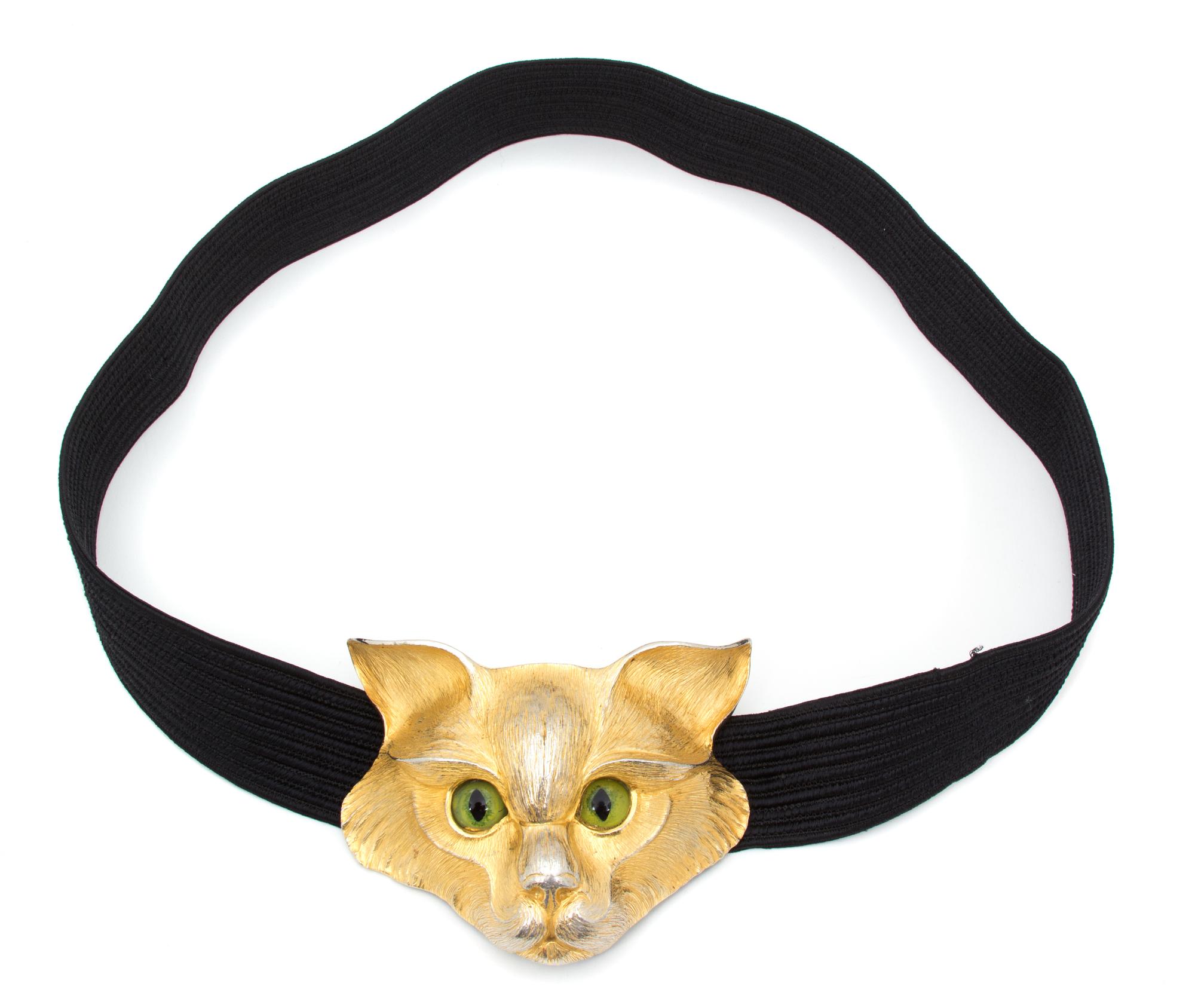 A Christopher Ross Goldtone Cat Belt, Buckle: 6" x 4"; Belt: 36".