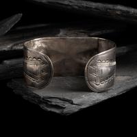 Early Navajo Heavily Stamped and Chiseled Ingot Cuff Bracelet, with Repoussé Elements