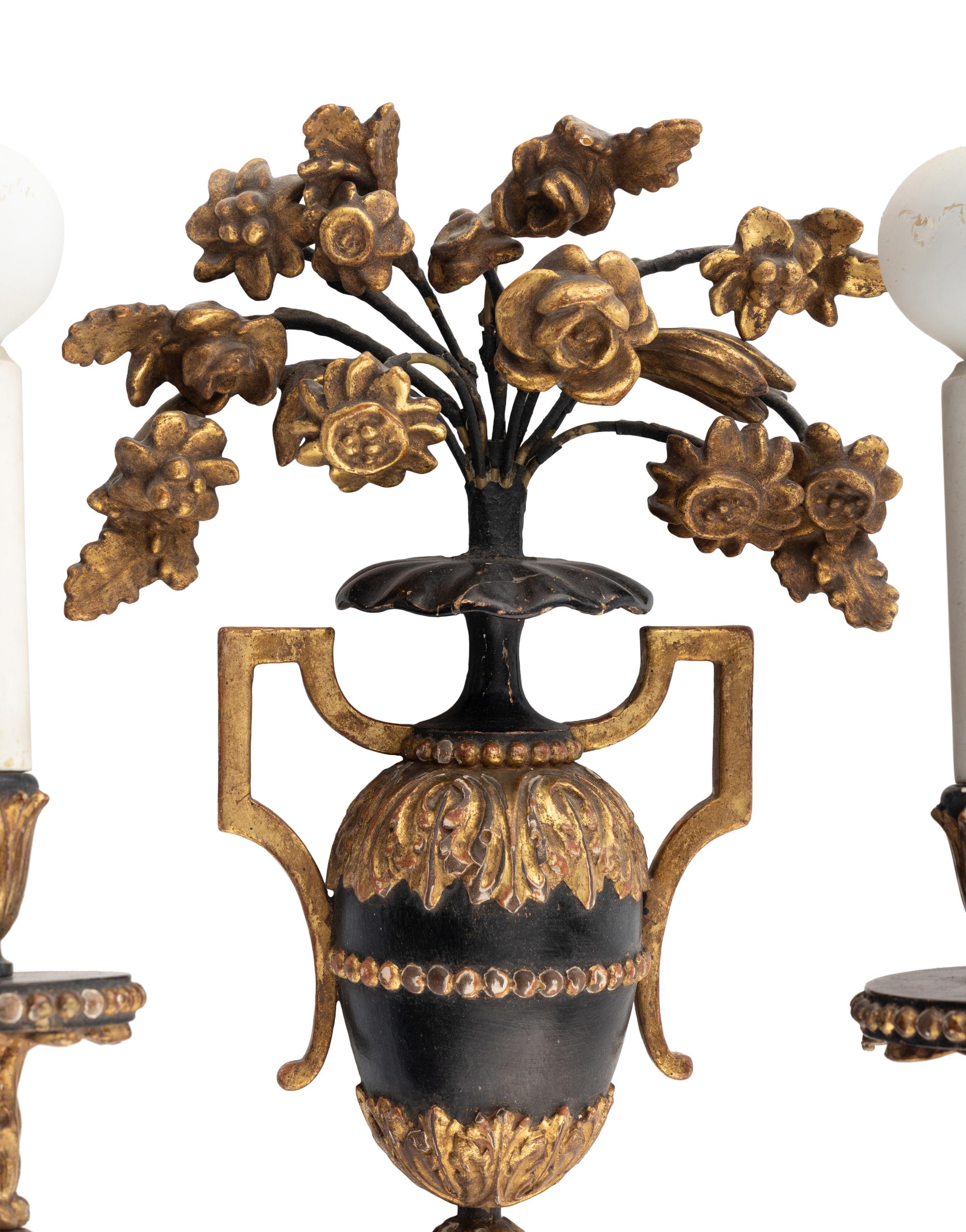 A Set of Four Italian Painted and Parcel Gilt Sconces