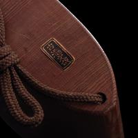 A Japanese Gold Decorated Wood Three-Case Inro