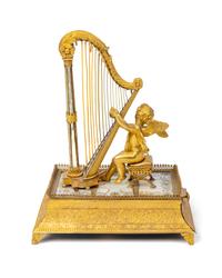 A Palais Royal Gilt Musical Ring Stand