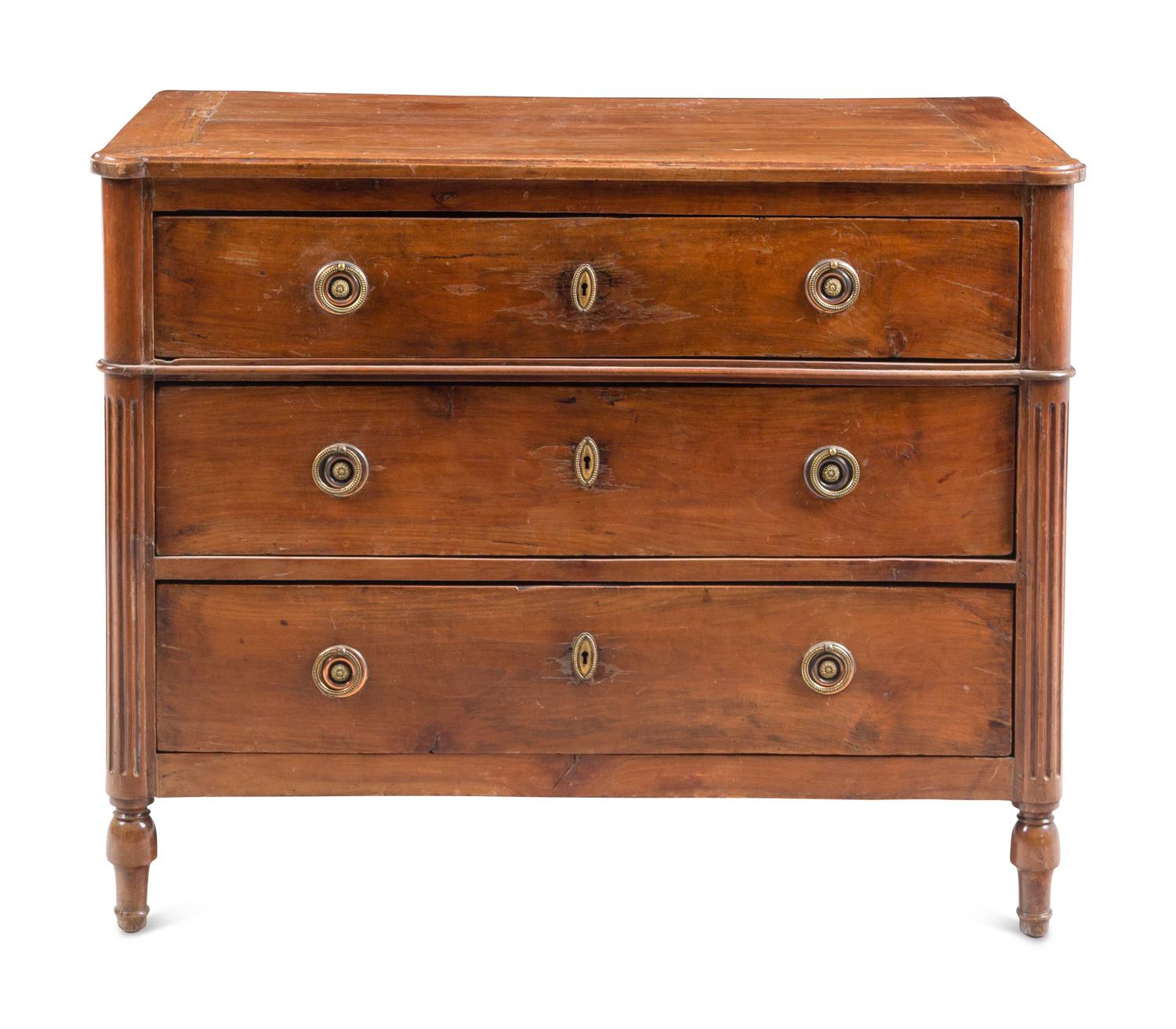 A Louis XVI Style Walnut Commode