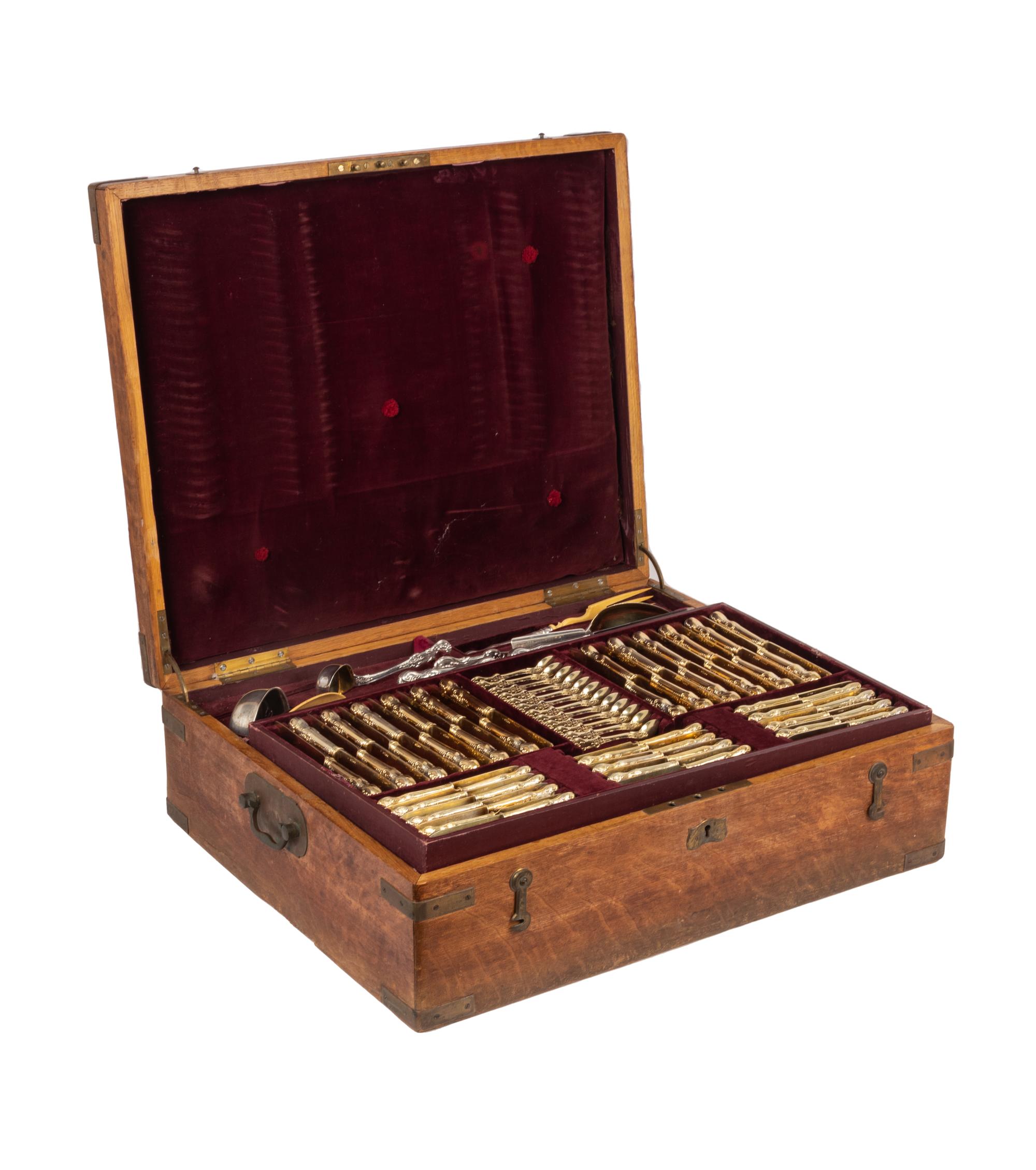 An Extensive Russian Silver and Silver-Gilt Flatware Service in Original Fitted Case