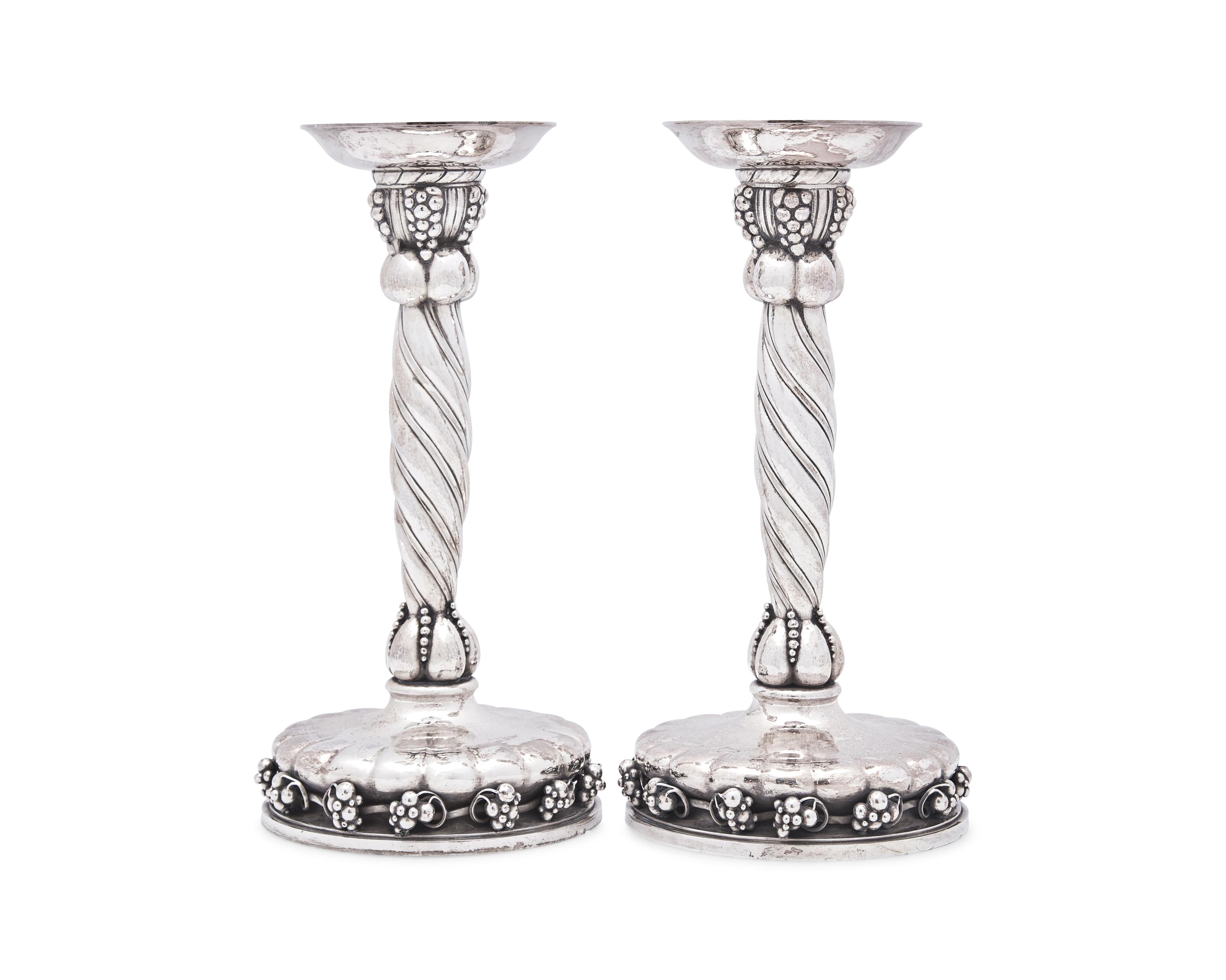 A Pair of Georg Jensen Silver Candlesticks