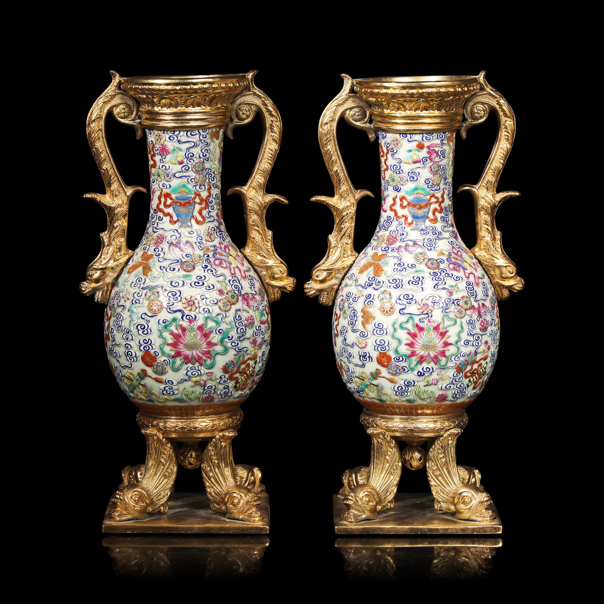 A Pair of Gilt Bronze Mounted Chinese Famille Rose Vases, the Porcelain 19th Century 清中期 粉彩雲蝠八寶紋鑲鎏金配件賞瓶一對
