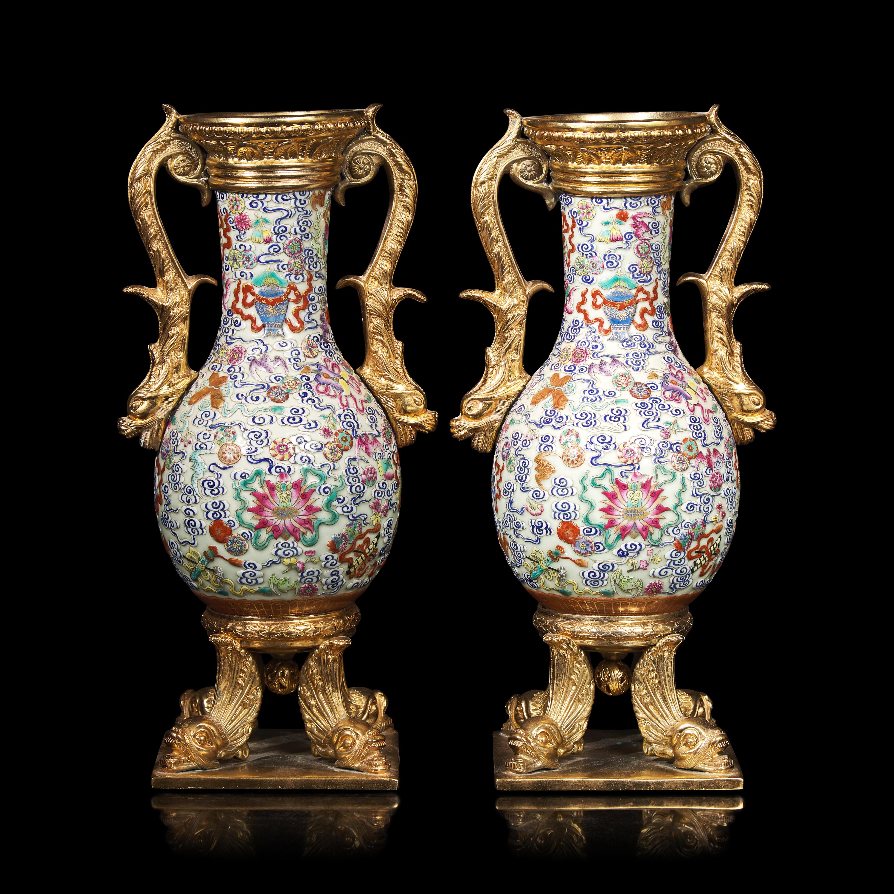 A Pair of Gilt Bronze Mounted Chinese Famille Rose Vases, the Porcelain 19th Century 清中期 粉彩雲蝠八寶紋鑲鎏金配件賞瓶一對