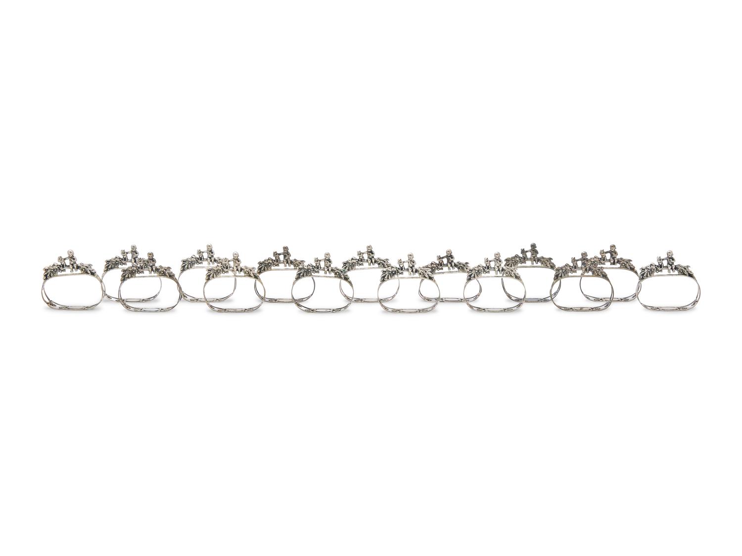 A Set of Fifteen German Silver Napkin Rings
