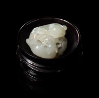 A Carved White Jade 'Double Badgers' Group