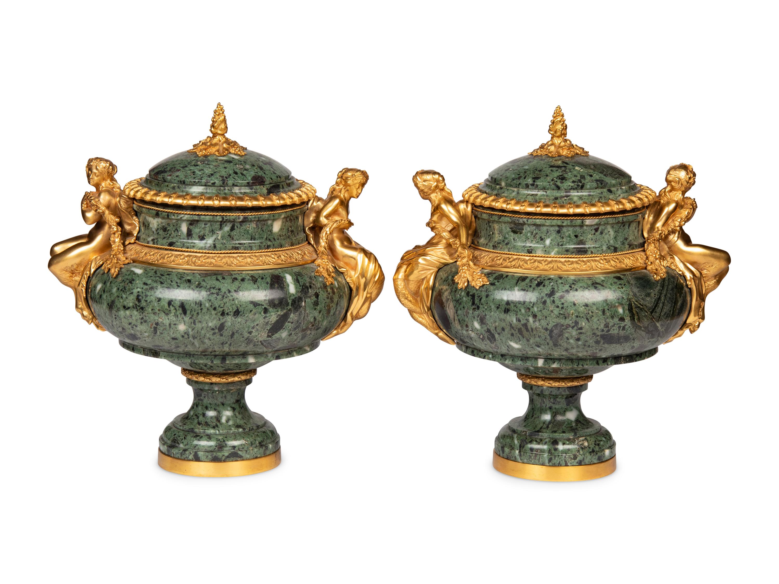 A Pair of French Gilt Bronze Mounted Marble Urns