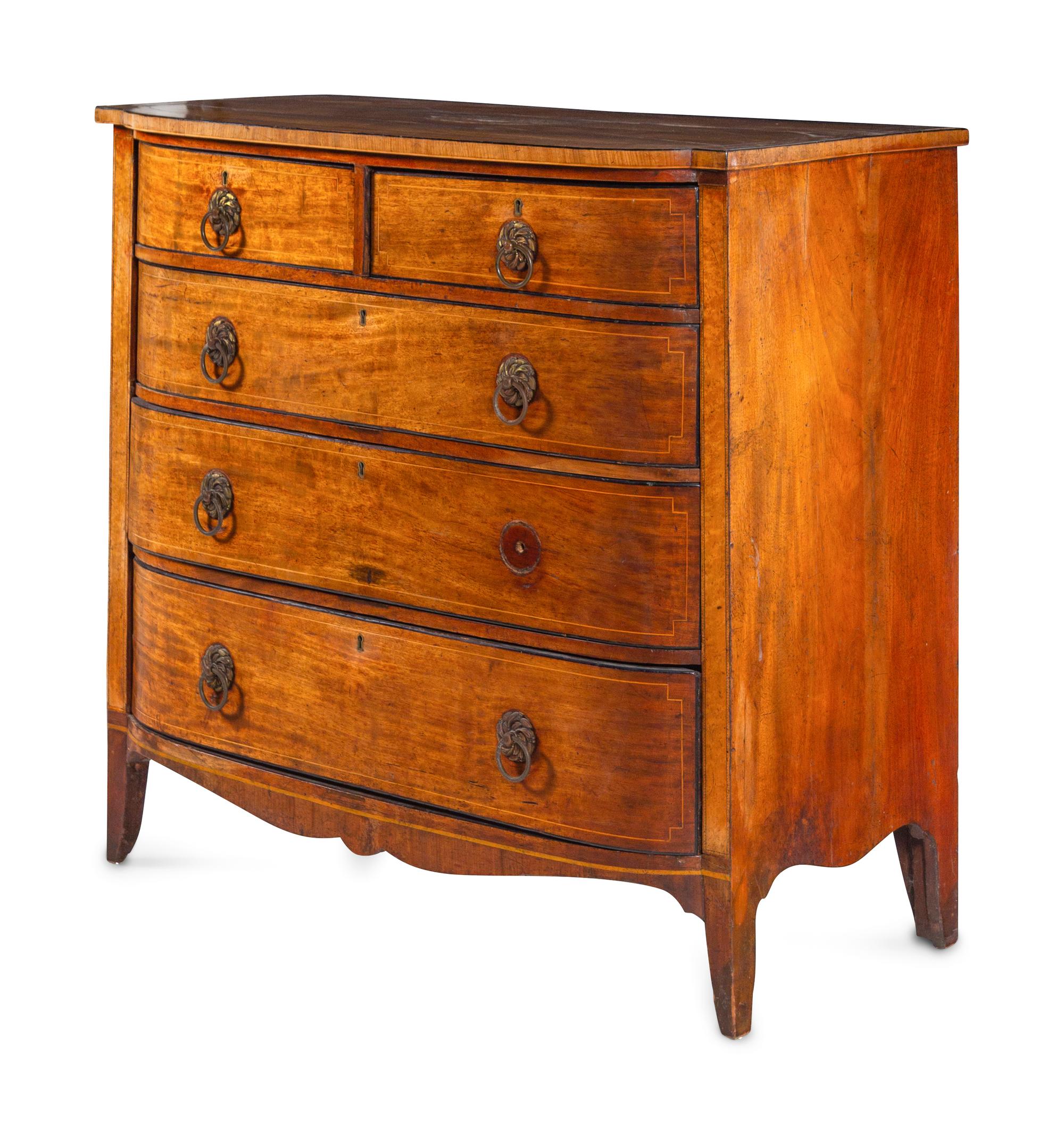 A Regency Satinwood Strung Mahogany Chest of Drawers