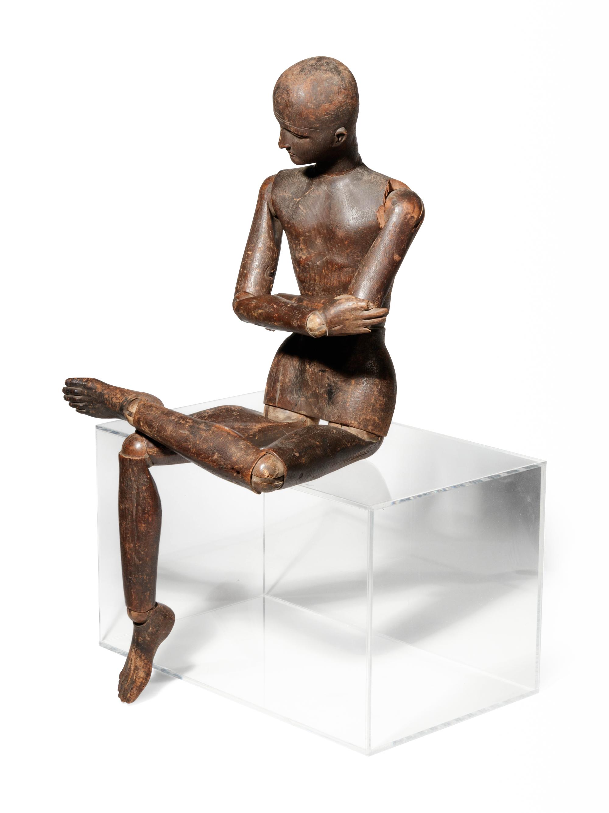 A Continental Carved Pine Articulated Model