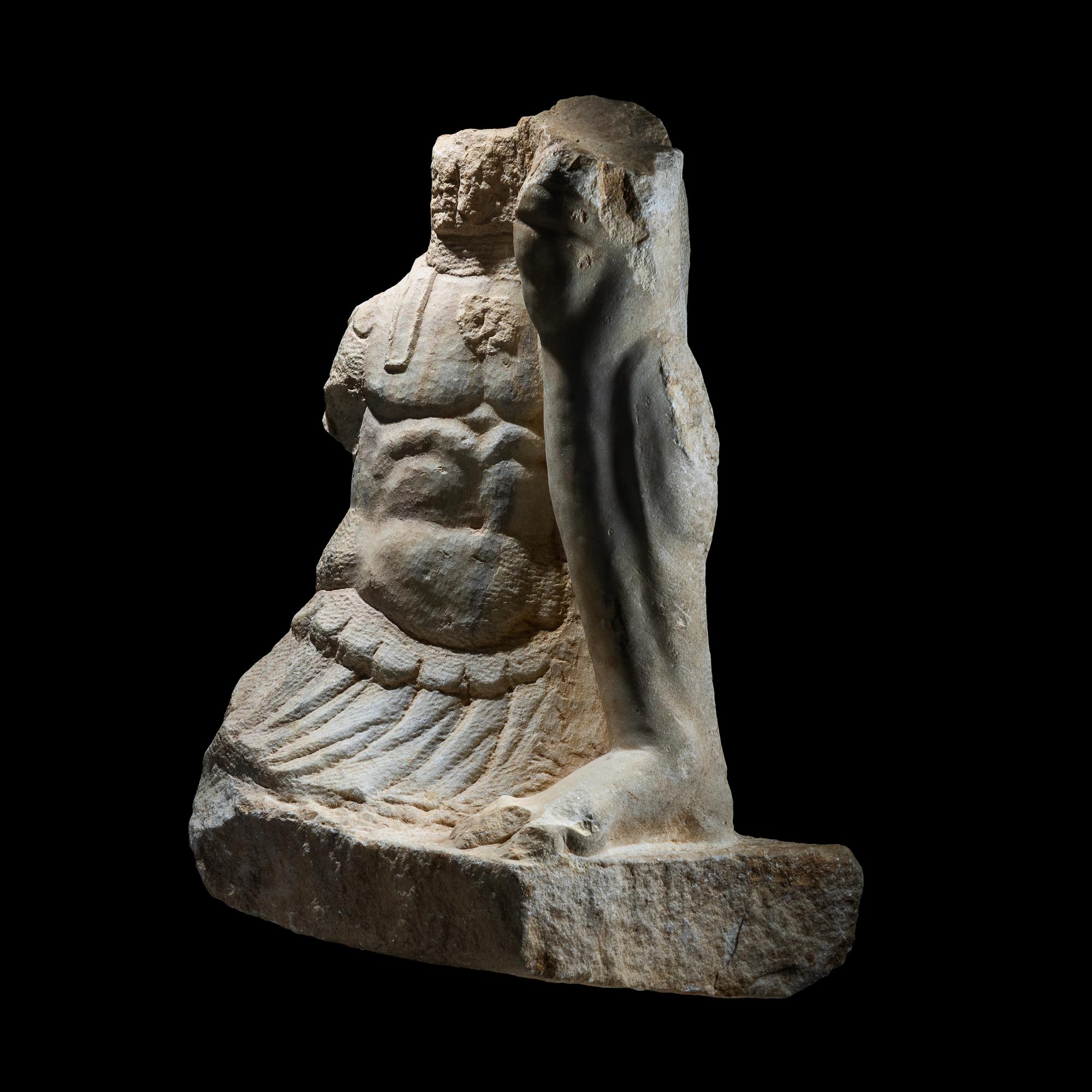 A Roman Marble Fragment from a Monumental Statue of the God Mars