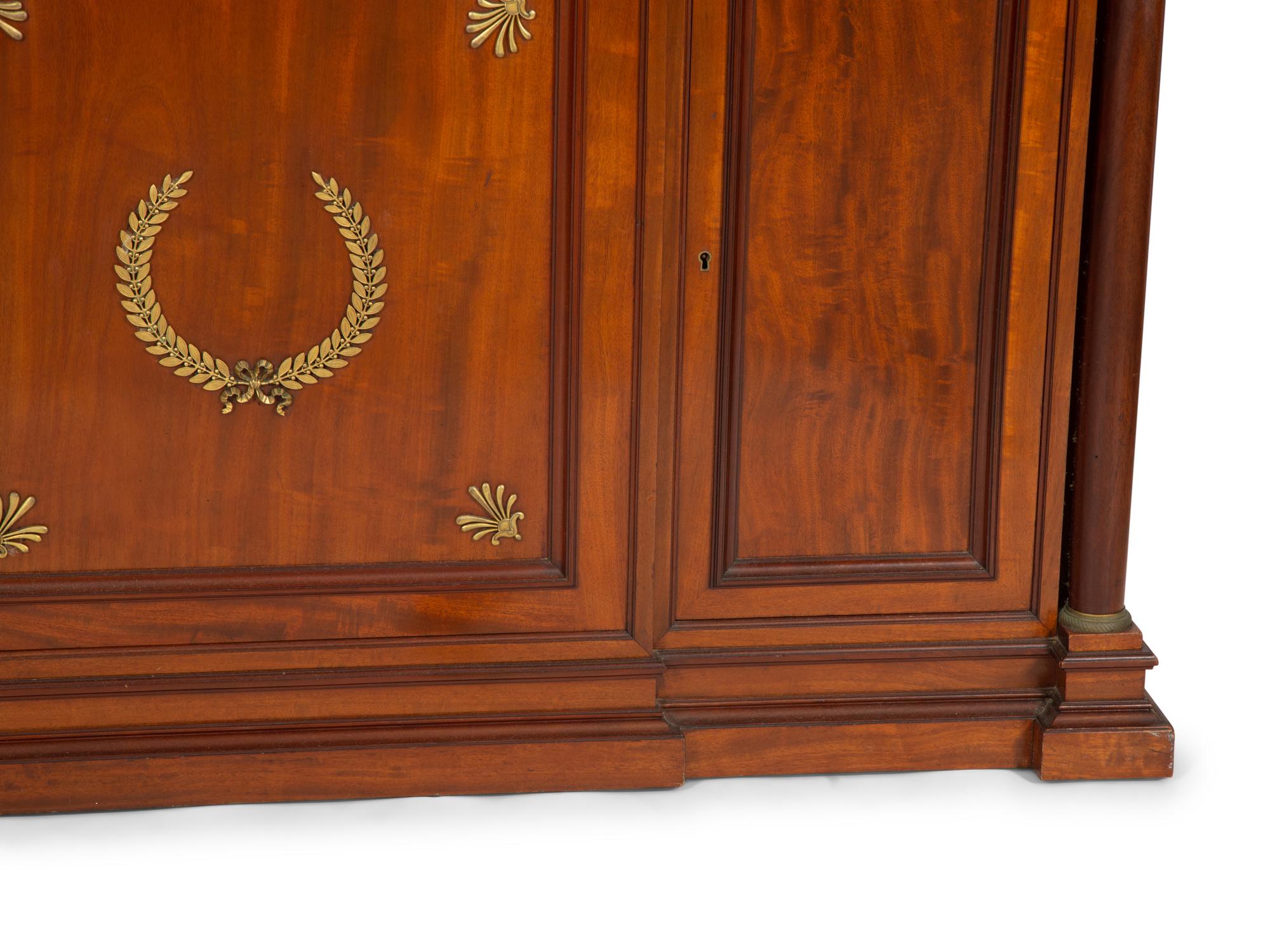 A French Empire Gilt Metal Mounted Mahogany Marble Top Sideboard