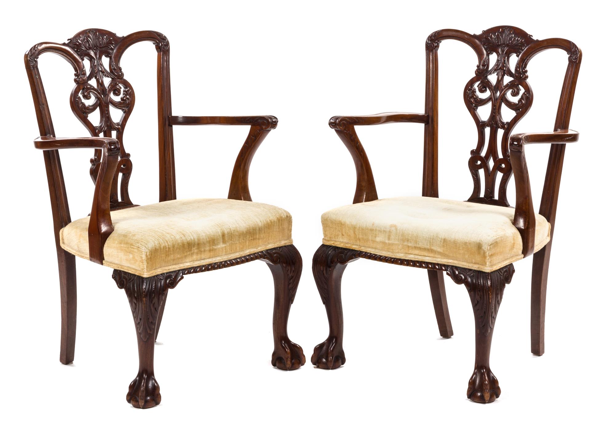 A Pair of Chippendale Style Mahogany Open Armchairs, Height 38 1/2 inches.