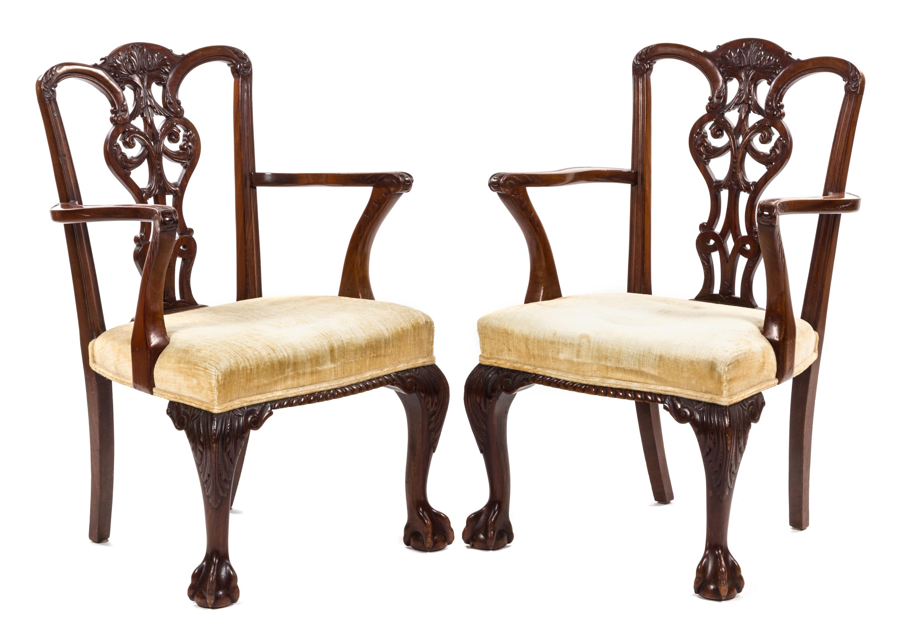 A Pair of Chippendale Style Mahogany Open Armchairs, Height 38 1/2 inches.