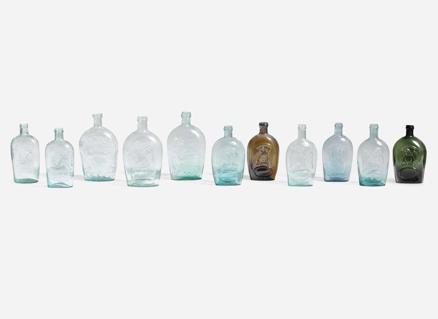 A collection of eleven mold-blown colored glass flasks, various makers, 19th century