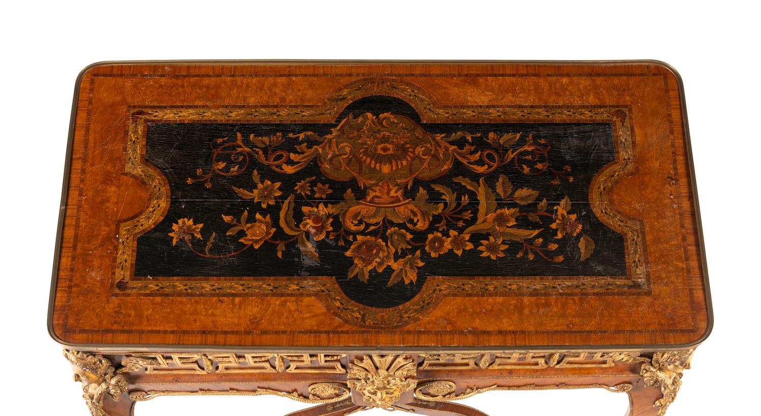 A Régence Style Gilt Bronze Mounted Kingwood and Floral Marquetry Table
