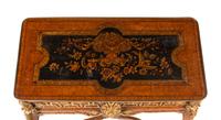 A Régence Style Gilt Bronze Mounted Kingwood and Floral Marquetry Table