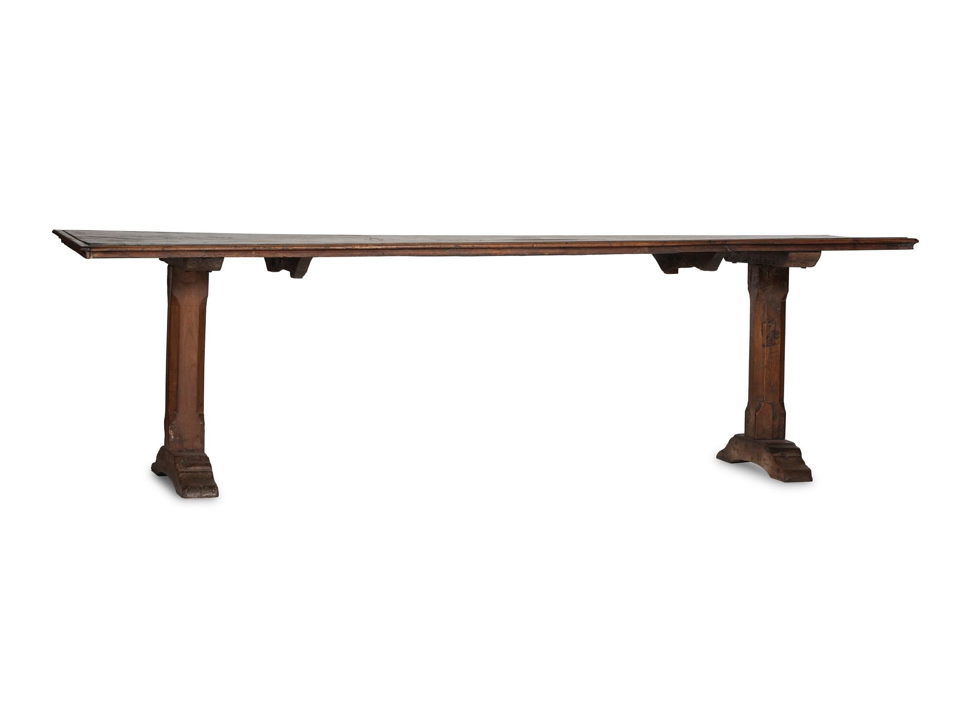 An Italian Carved Walnut Refectory Table