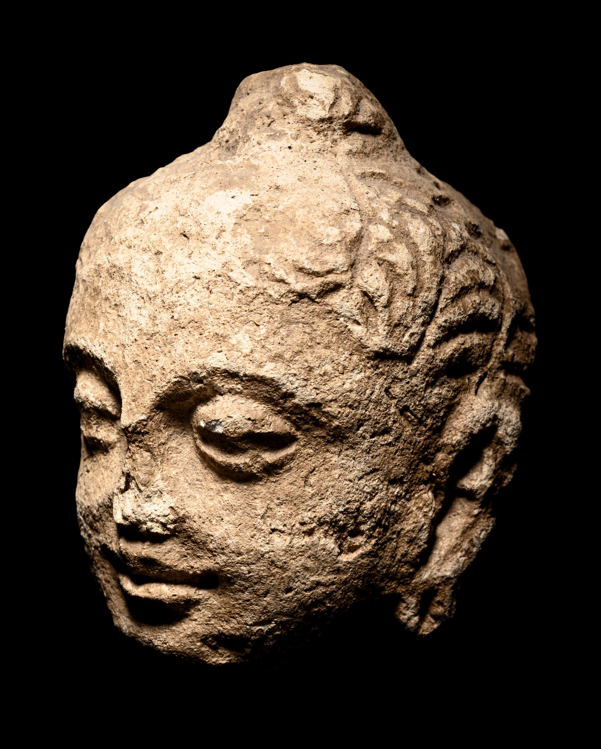 Two Gandharan Fragmentary Stucco Heads