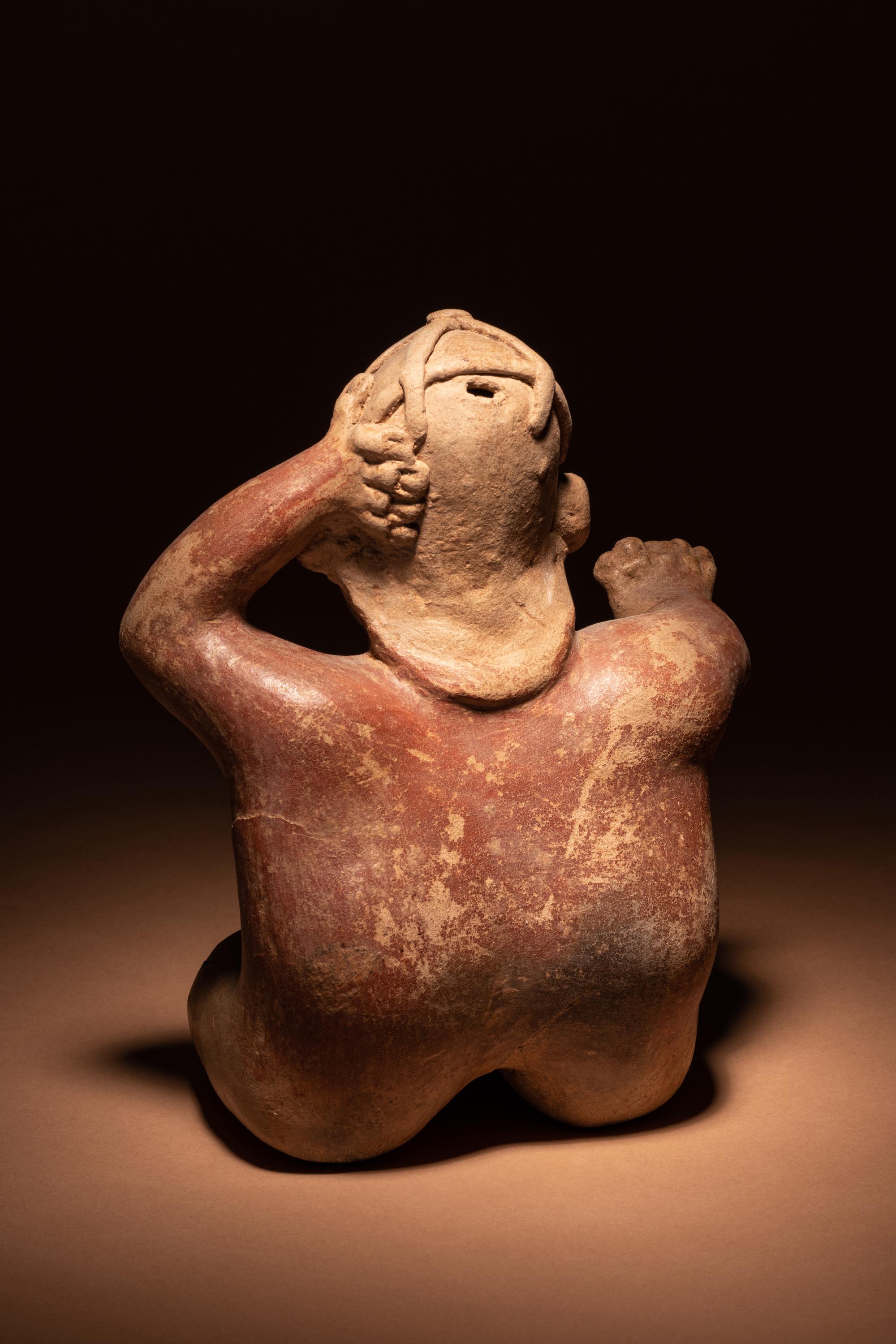 A Jalisco Terracotta Seated Figures