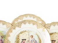 Twelve Sèvres Gilt Decorated Porcelain Dinner Plates