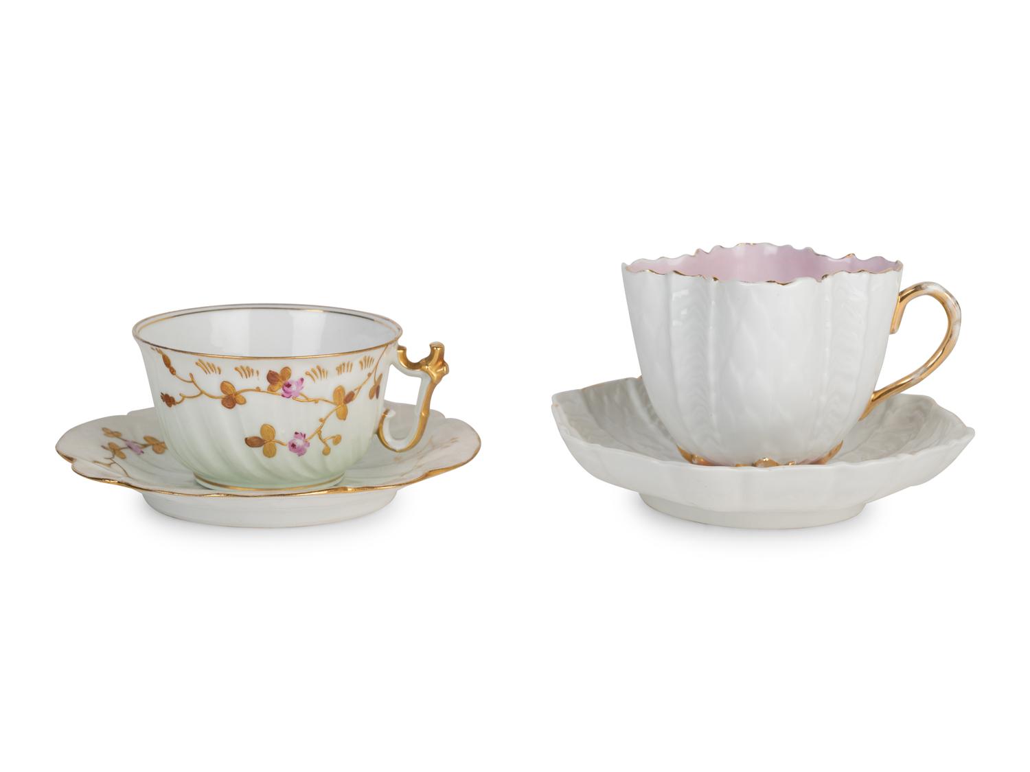 Two Continental Porcelain Moustache Cups and Saucers