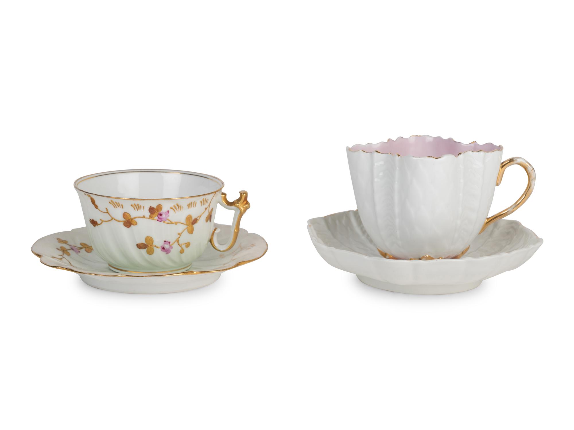 Two Continental Porcelain Moustache Cups and Saucers