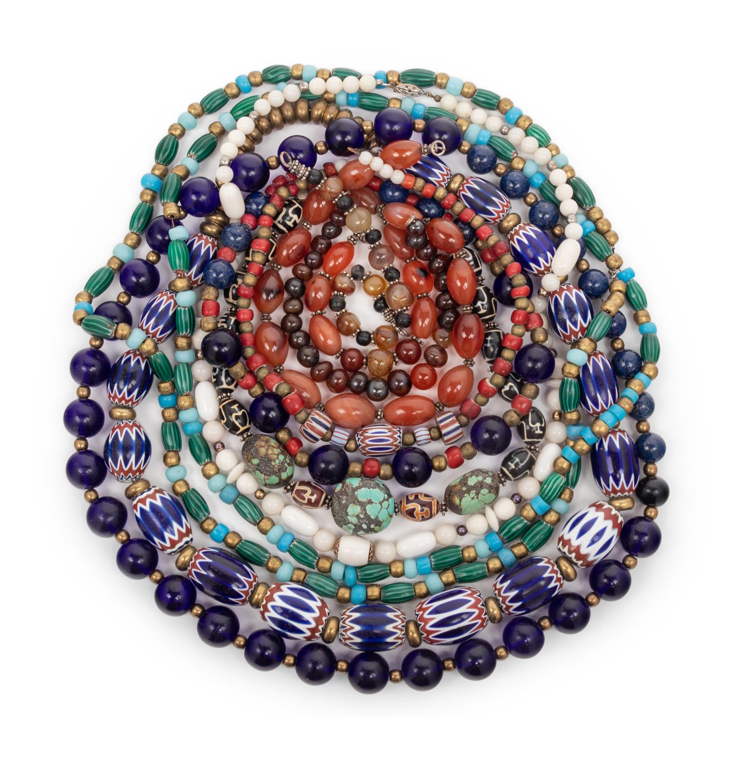 A Group of Thirteen Necklaces and Three Bracelets