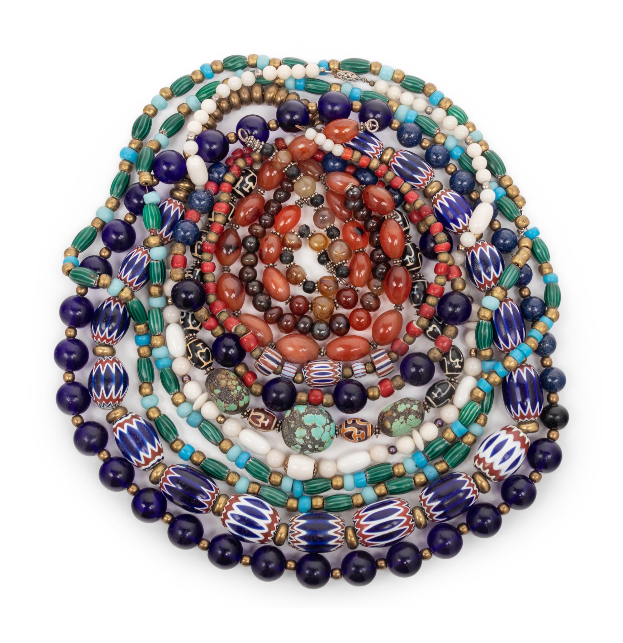 A Group of Thirteen Necklaces and Three Bracelets