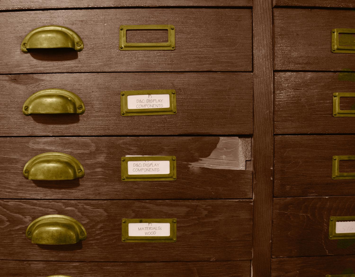 A Wooden File Cabinet 50" W x 29" D x 63" H — United States, 20th Century