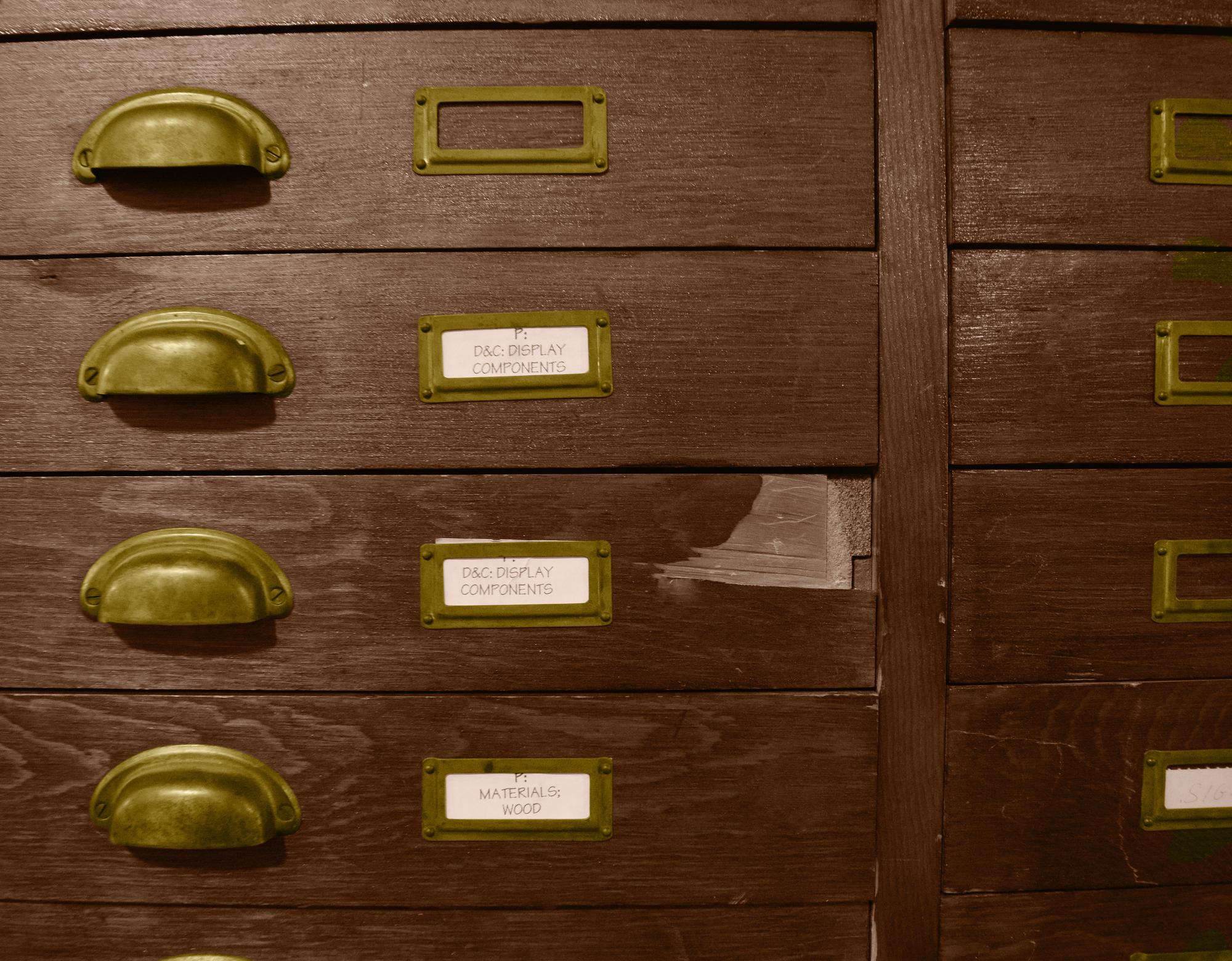 A Wooden File Cabinet 50" W x 29" D x 63" H — United States, 20th Century