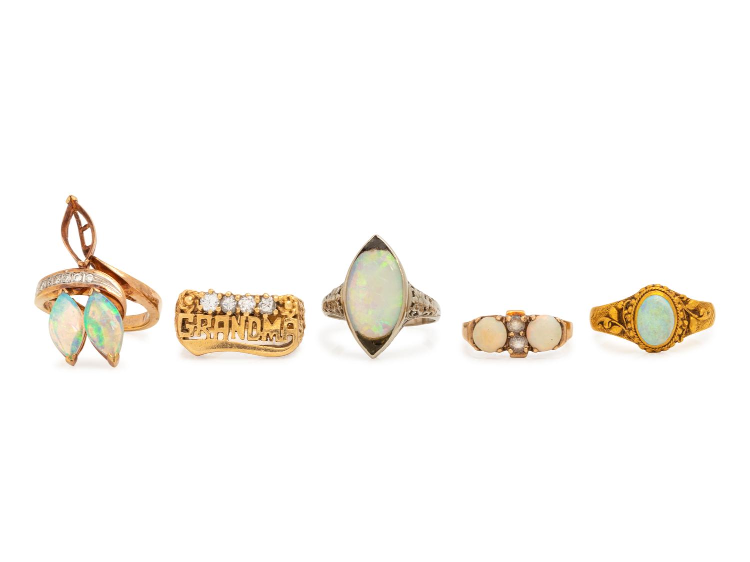 A Collection of Gold, Opal and Diamond Rings,
