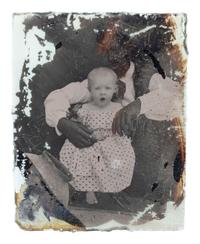 [EARLY PHOTOGRAPHY]. Ninth plate ambrotype of an African American man with white child, with rare Colonoware jar.