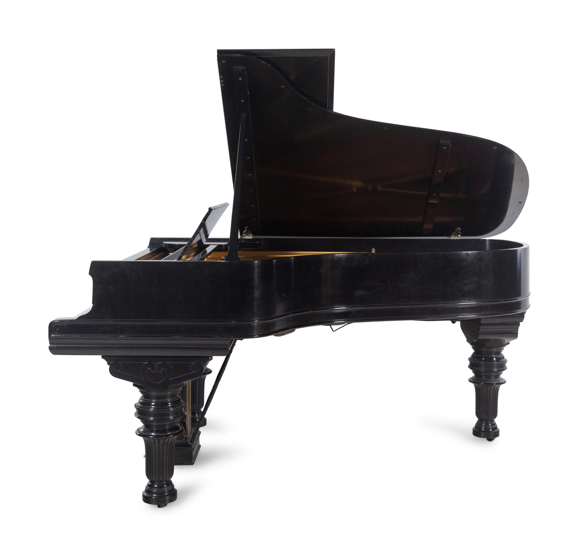A Steinway and Sons Ebonized Concert Grand Piano
