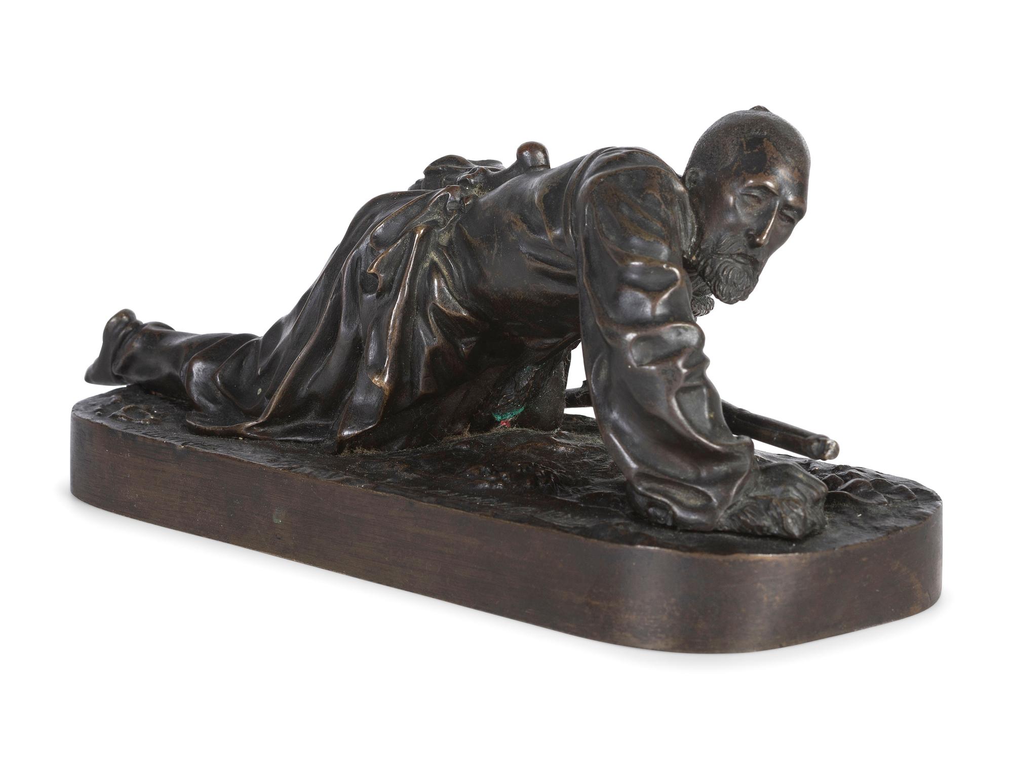 A Russian Bronze Figure of a Cossack