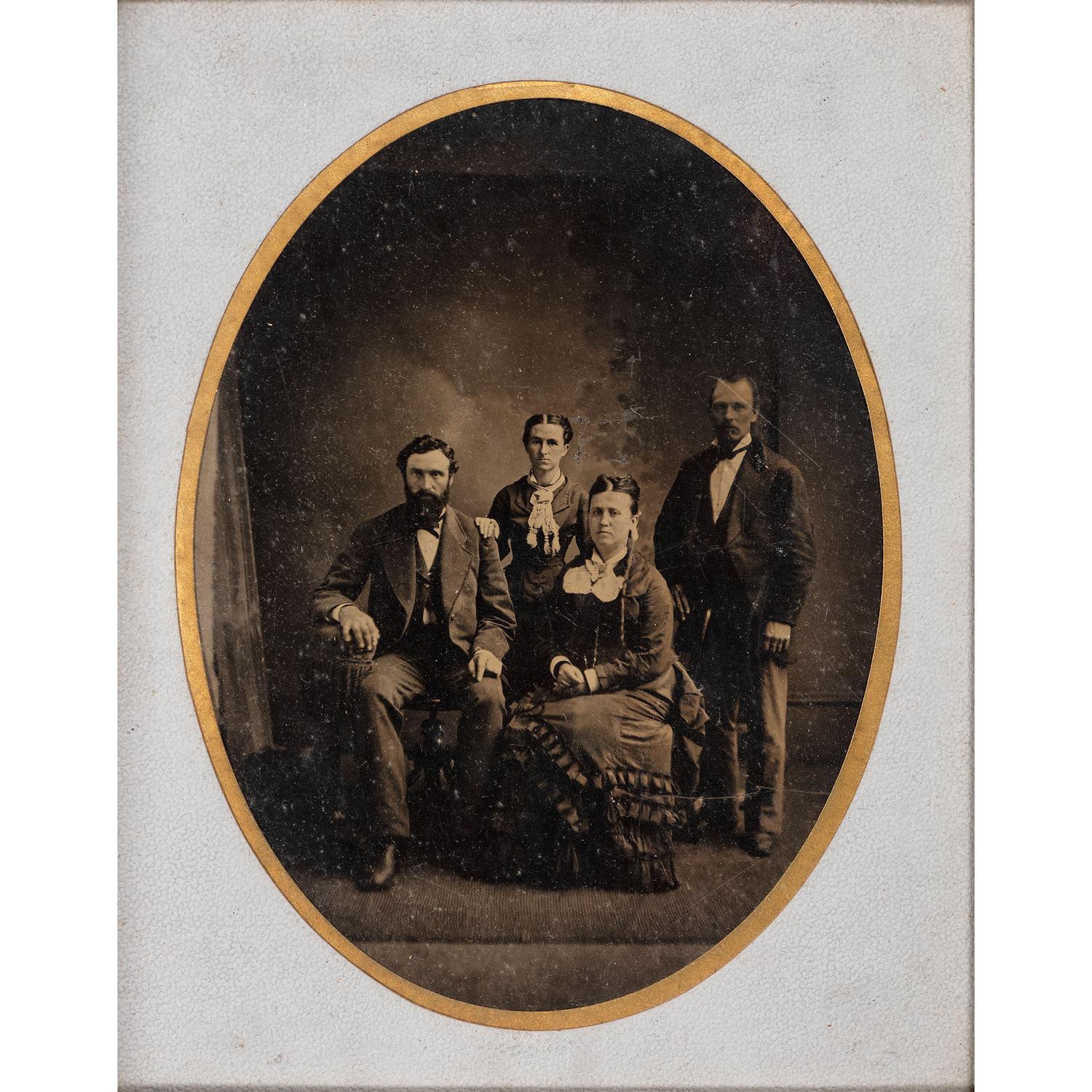 [EARLY PHOTOGRAPHY - PORTRAITURE]. A pair of framed tintypes of groups of people, comprising: