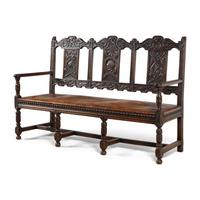 A Continental Carved Oak Hall Bench