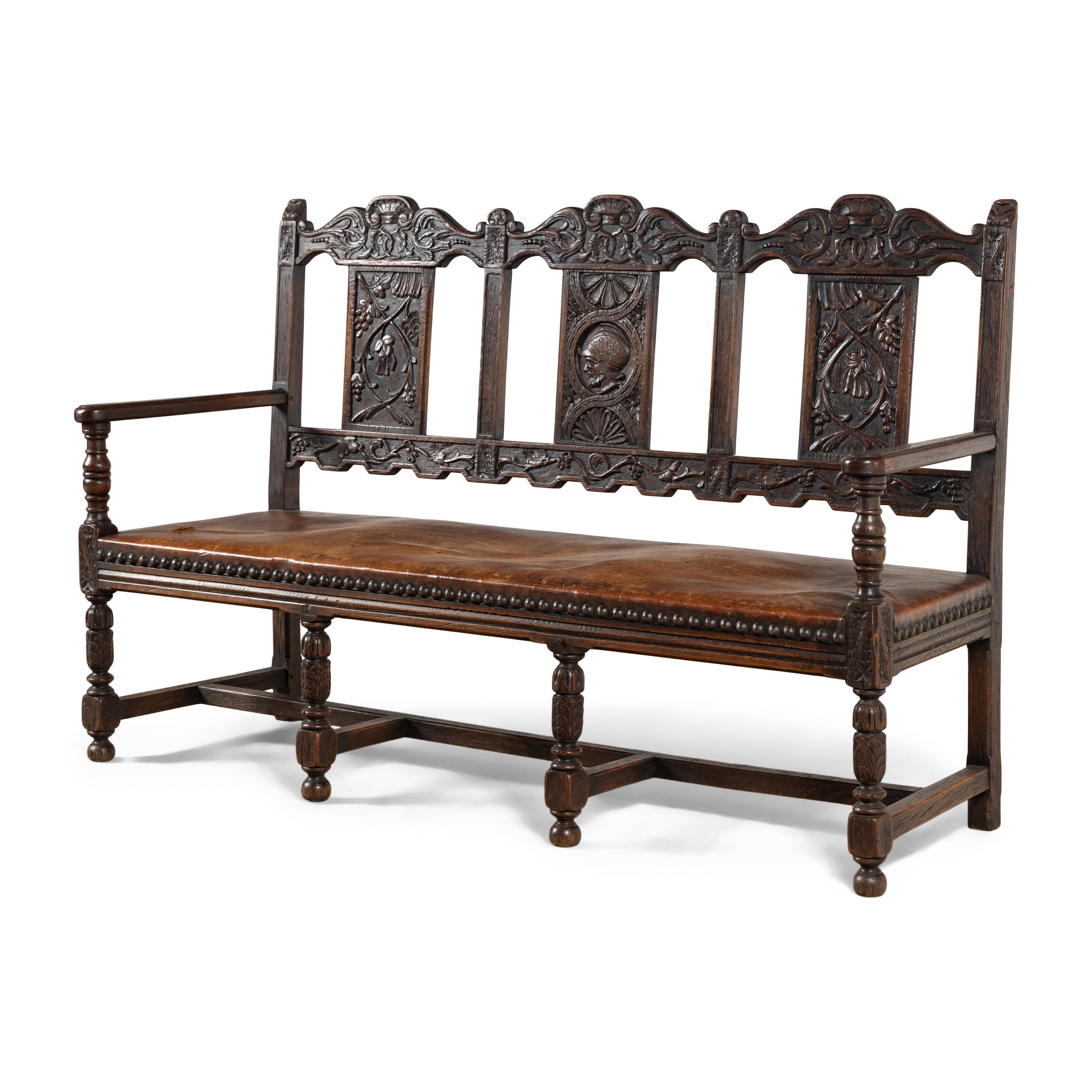 A Continental Carved Oak Hall Bench