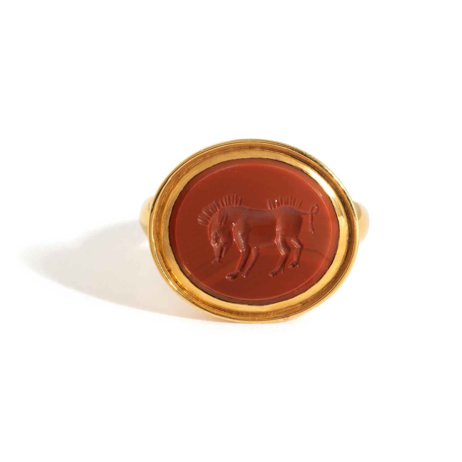 A Roman Red Jasper Ring Stone with a Boar — Set in a gold ring